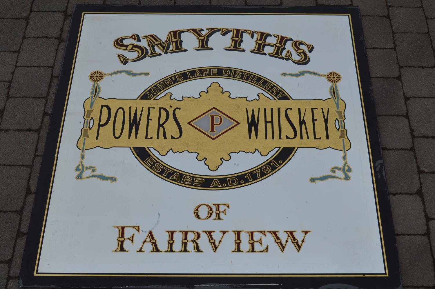 Powers Whiskey advertising mirror.