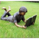 Cast bronze models of a Boy.