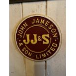 Cast iron John Jameson advertising sign.