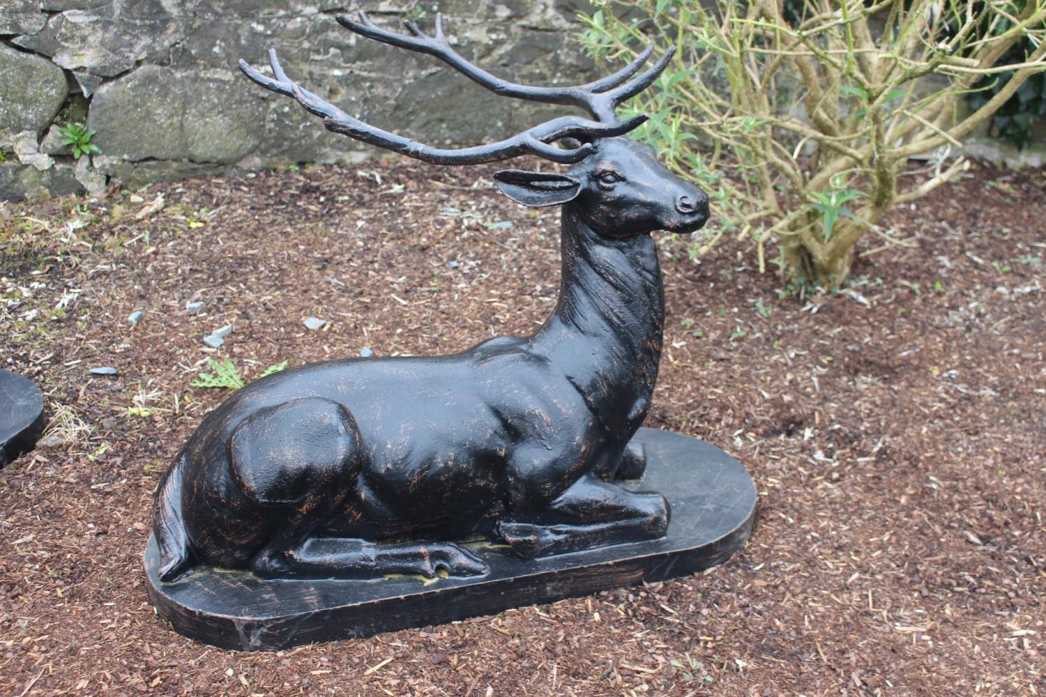 Cast iron model of a seated Stag.