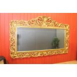 Decorative carved giltwood mirror
