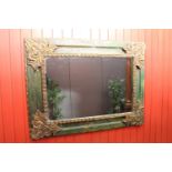 Distressed giltwood and painted wall mirror