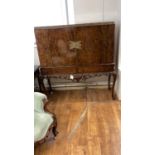 Edwardian burr walnut drinks cabinet.