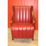 Leather upholstered open armchair