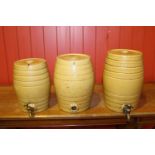 Graduated Set of three 19th C. ceramic glazed dispensers