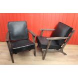 Pair of wooden and leather upholstered easy chairs