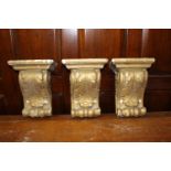 Three plaster corbels