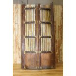 Pair of oak doors with brass mounts