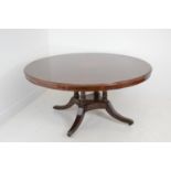 Mahogany circular dining table.