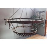 Good quality wrought iron hanging chandelier in the Medieval style {90 cm H x 137 cm Dia.}.