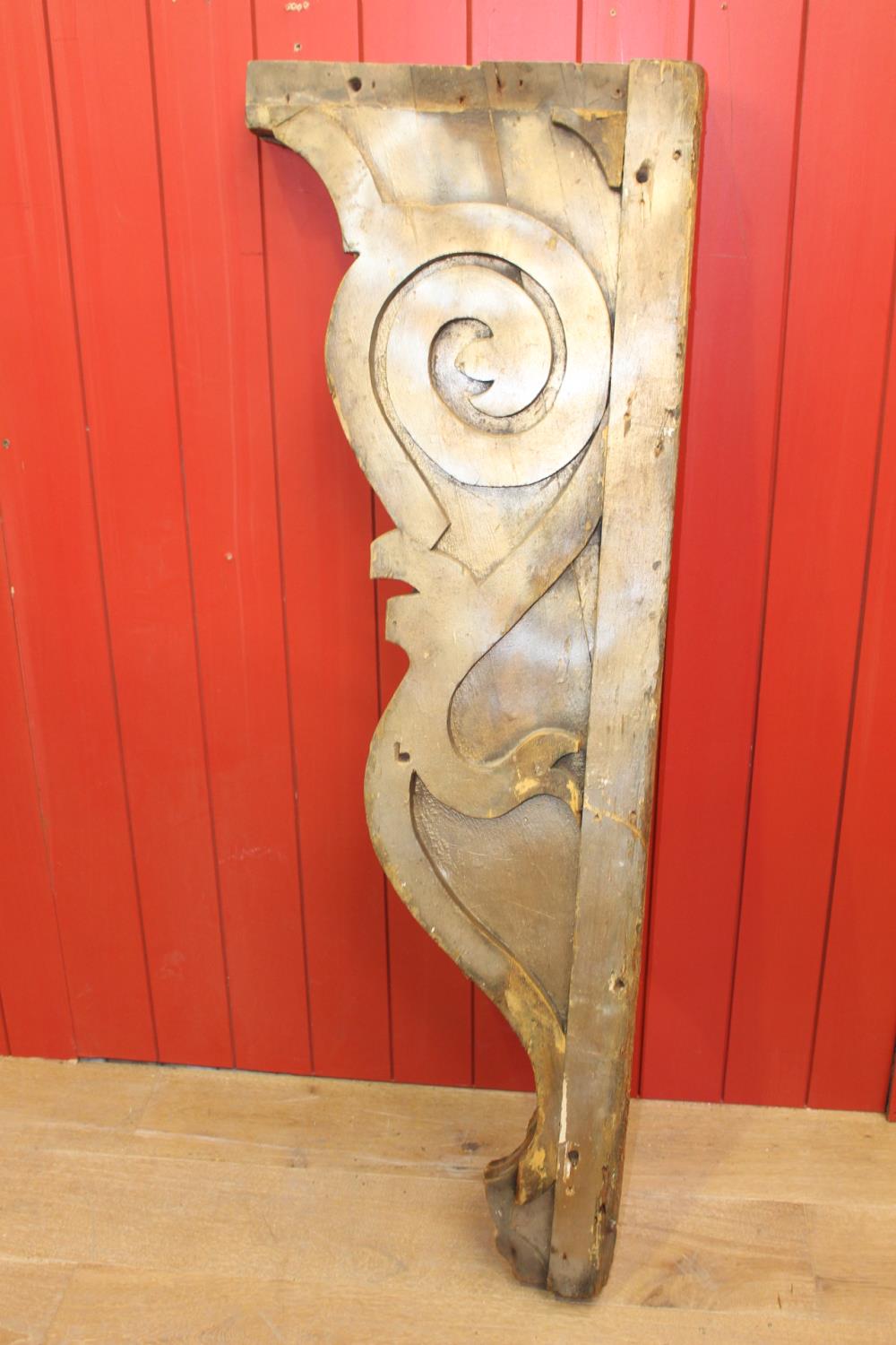 Single carved wooden corbel