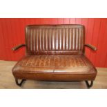 Leather upholstered ribbed two seater sofa