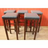 Set of five leather upholstered wooden high stools