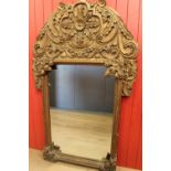 Highly carved wooden mirror
