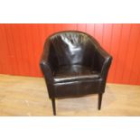 Leather upholstered tub chair