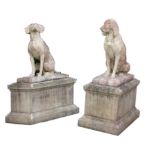 Pair of stone models on seated hounds