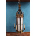 Good quality bronze and wrought iron lantern with leaded glass panels in the Gothic manner {143 cm H