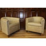 Pair of leather upholstered club chairs