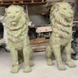 Pair of cast bronze models of Lions.