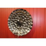 White metal circular wall candle holder