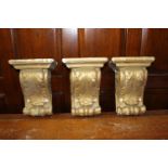 Three plaster corbels