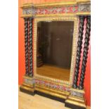 Decorative giltwood and ebonised wall mirror