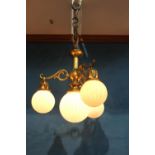 Brass three branch hanging lightshades