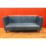 Leather upholstered three seater settee