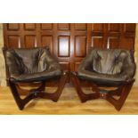 Pair of leather and wooden bucket chairs