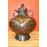 Three handled urn.