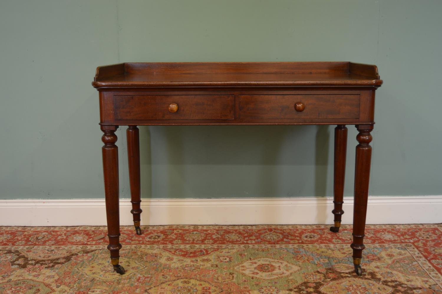 Victorian mahogany two drawer writing table on four turned legs. - Image 2 of 2