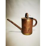 Early 20th C. copper and brass watering can {34 cm H x 47 cm W x 20 cm D}.