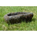 Oval stone trough.