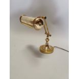 Brass desk lamp.