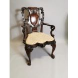 Good quality carved mahogany open arm chair