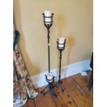 Pair of modern wrought iron candle sticks