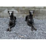 Pair of bronze seated Whippets.