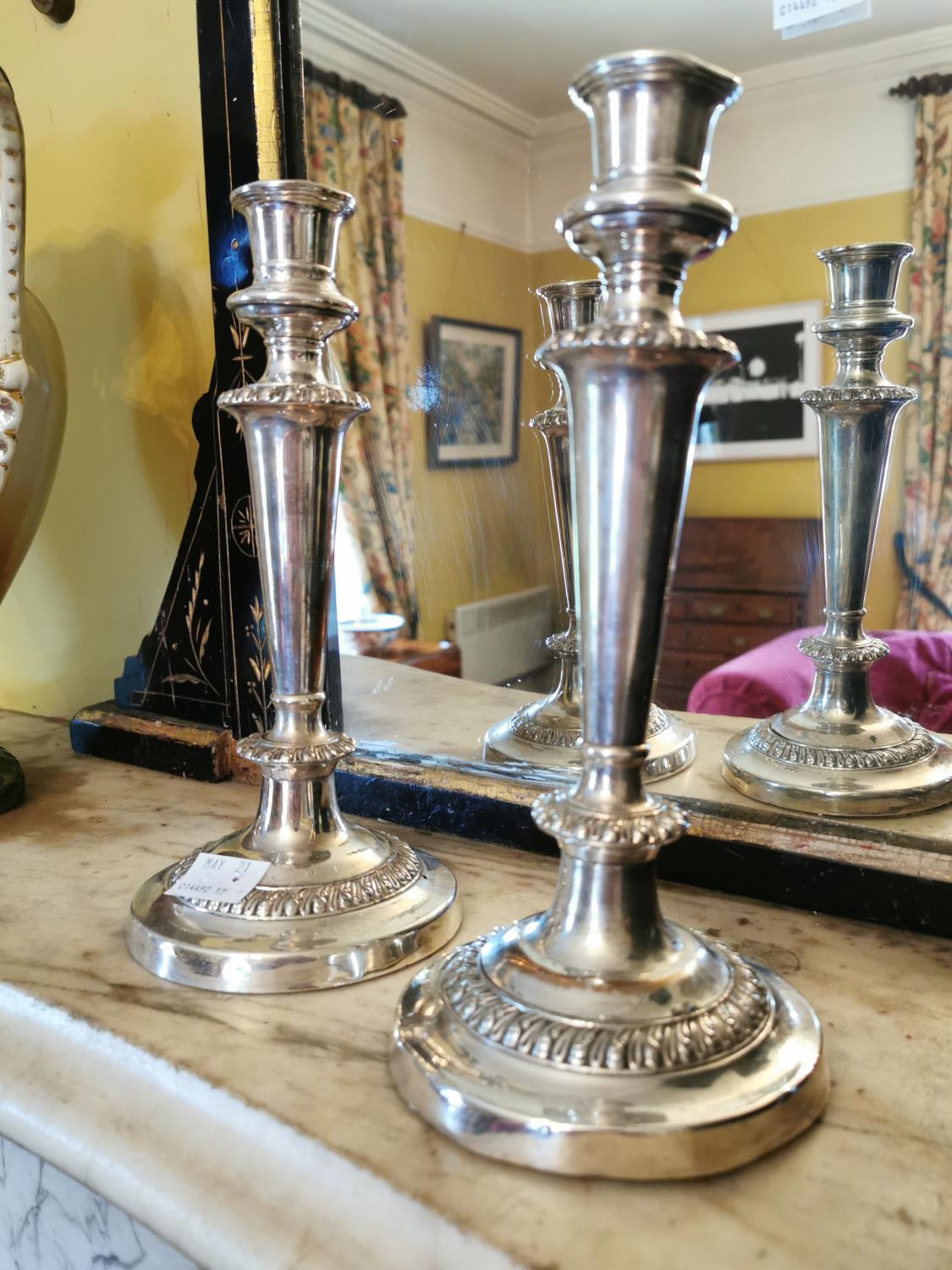 Pair of 19th. C. silverplated candlesticks.