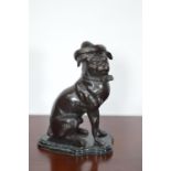 Bronze model of a seated Pug Dog