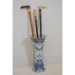Ceramic hand painted stick stand.