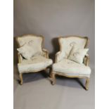 Pair of upholstered oak armchairs