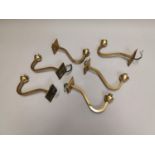 Set of six brass wall lights.