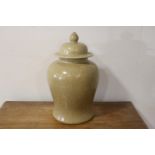 Glazed stone ware jar with lid