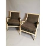 Pair of upholstered gilded and painted armchairs