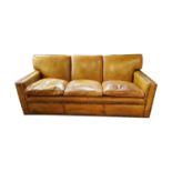 Three seater leather upholstered sofa