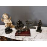 Collection of five bronzed models of dogs and children