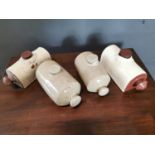 Four early 20th. C. stone ware hot water bottles