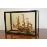 Model of sailboat Royal Sovereign mounted in glazed case.