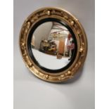 Gilt convex wall mirror