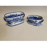 Two blue and white ceramic foot baths